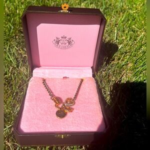 Juicy Couture charm and chain necklace from mid 2000s. In good condition.
